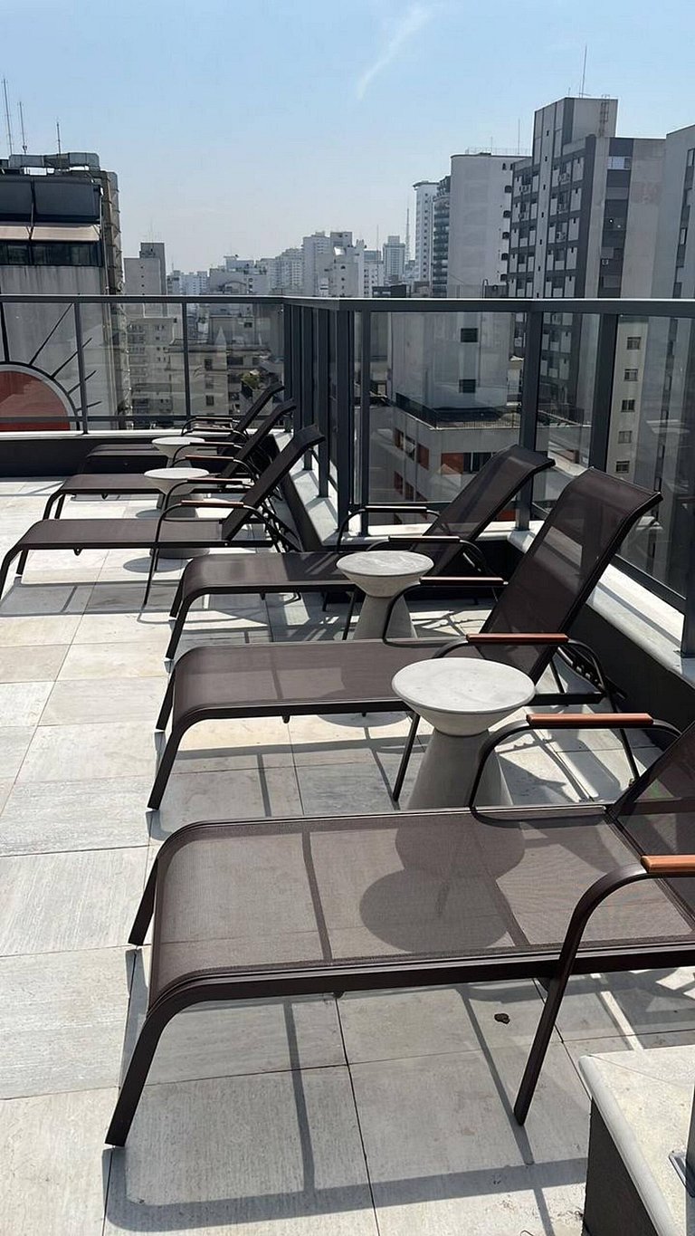With garage and rooftop, next to Av Paulista!