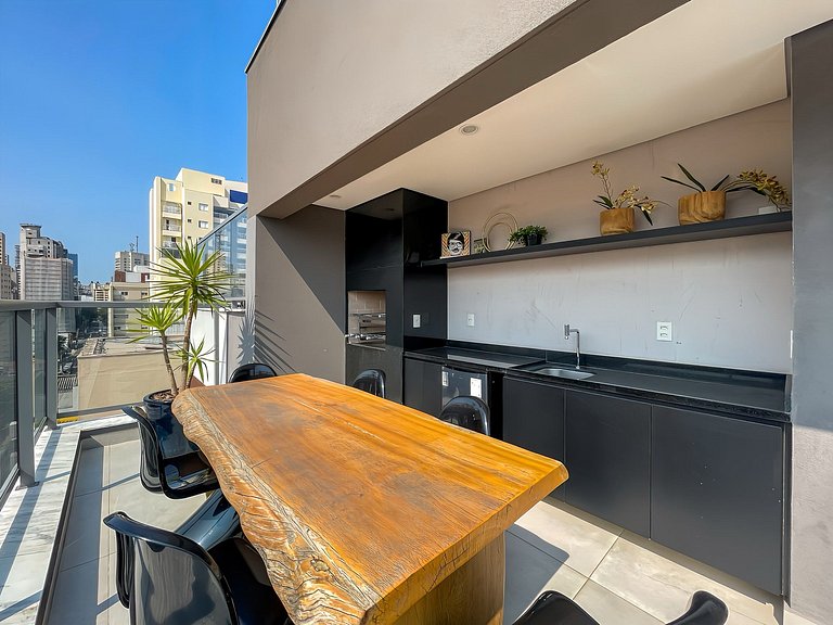 With garage and rooftop, next to Av Paulista!