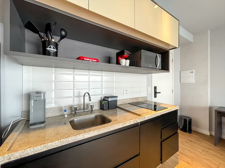 With garage and rooftop, next to Av Paulista!